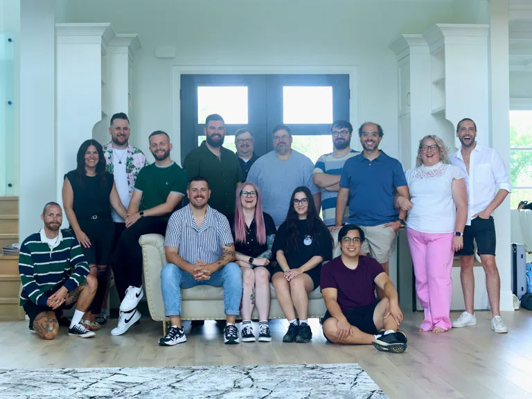 The team with bright window in background